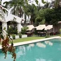 Piscina y jardín de Villa Marines Hotel Boutique